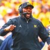 Michigan coach Sherrone Moore signs full contract, nearly 9 months after initial agreement