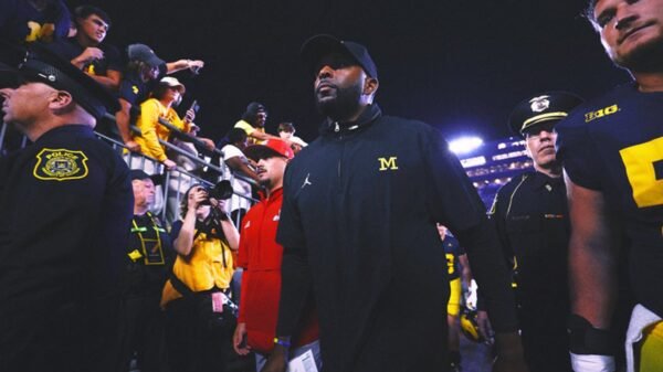 Michigan's Sherrone Moore has been coaching without a signed contract