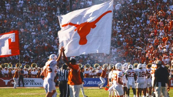 Texas players plant flag through Baker Mayfield Oklahoma jersey following win