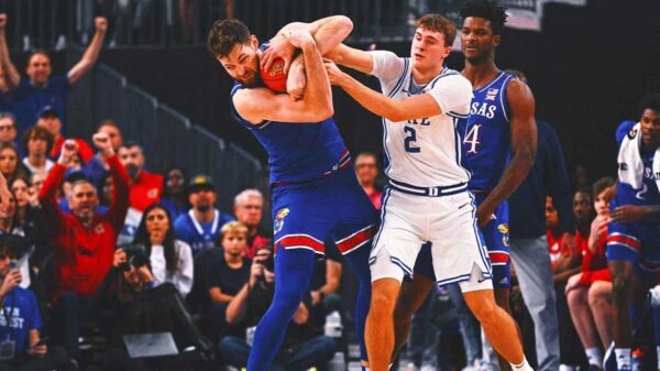 Kansas center Hunter Dickinson ejected for kicking Duke's Maliq Brown in the head