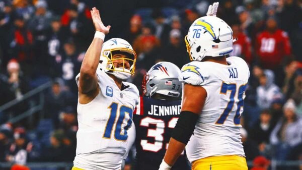 Chargers clinch playoff spot in Jim Harbaugh's 1st season with 40-7 rout of Patriots