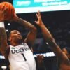 No. 11 UConn gets past Xavier 94-89 in overtime in its Big East opener