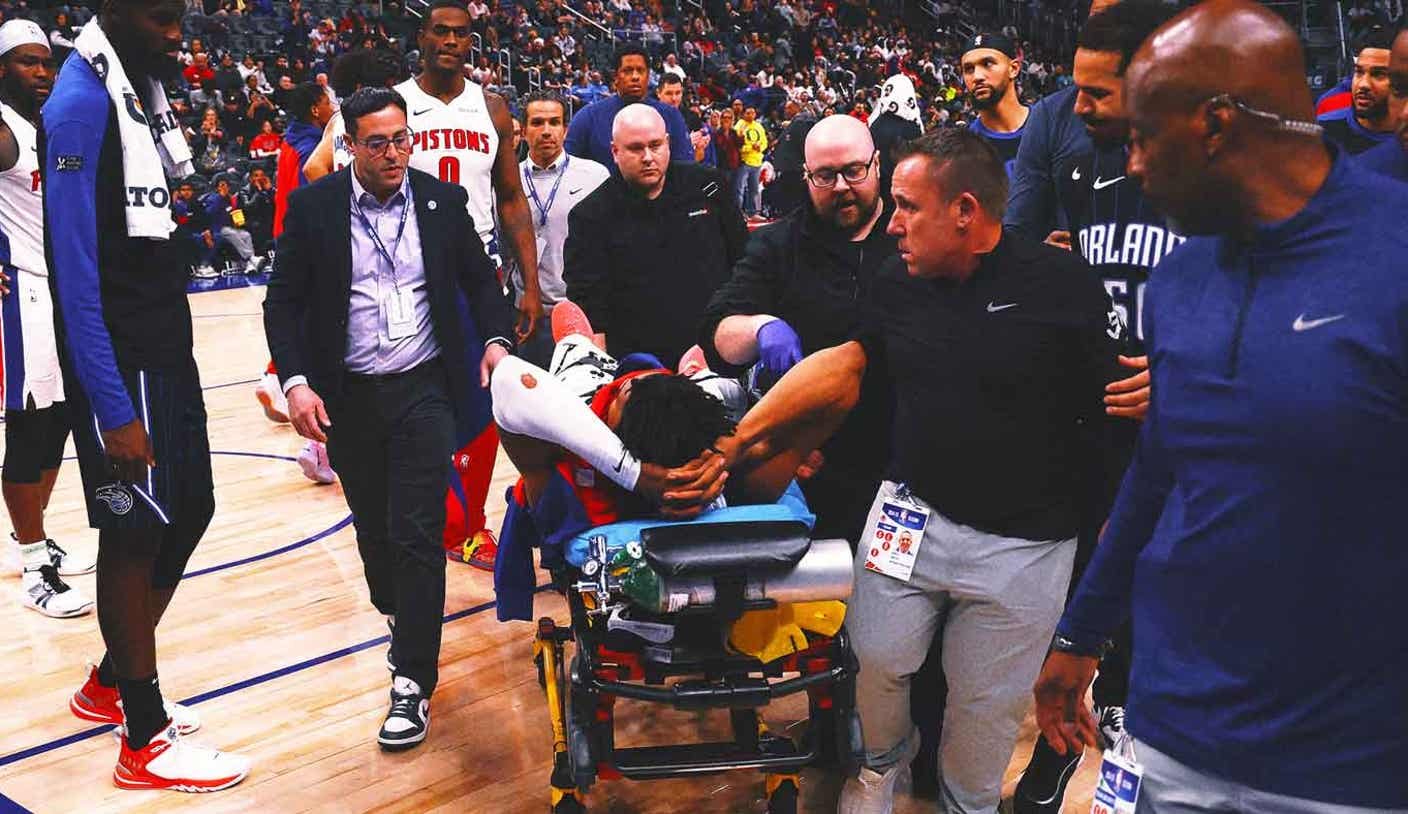 Pistons guard Jaden Ivey stretchered off with severe leg injury against Magic