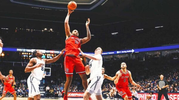 No. 20 St. John's rallies past Xavier 79-71 in OT, moves into 1st place in Big East