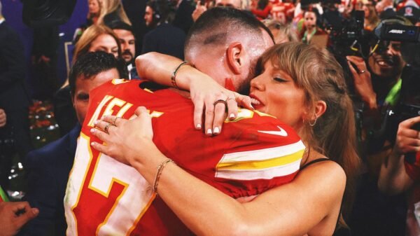 How is Travis Kelce coping with the Chiefs' Super Bowl loss? By listening to Taylor Swift