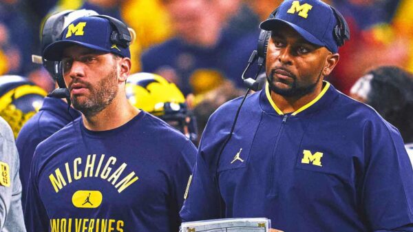 Former Michigan assistant coach charged with hacking athletes' intimate photos